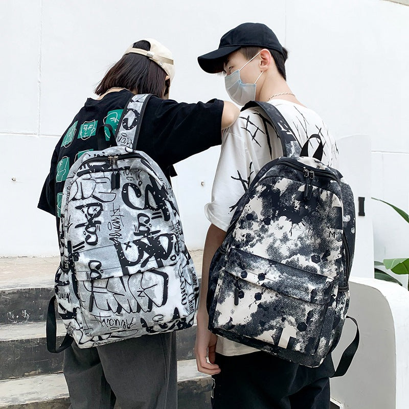 Large canvas backpack with graffiti print