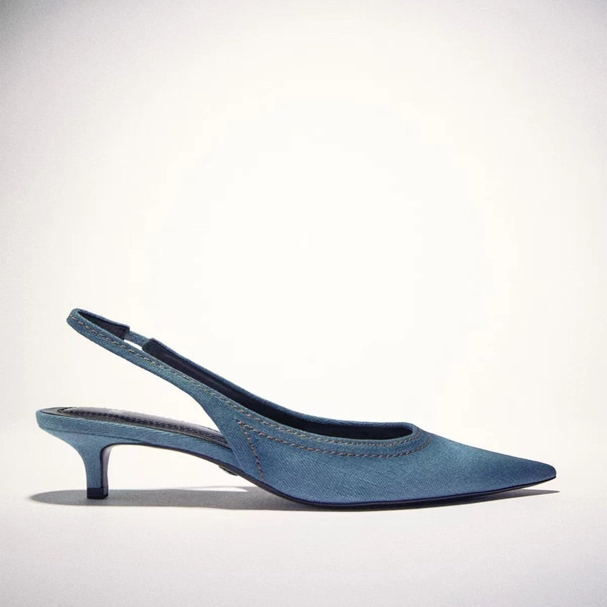 Women's high heels made of blue denim fabric