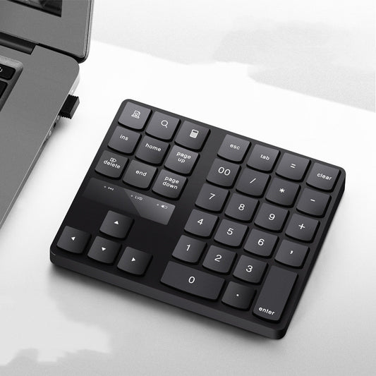 Multifunctional wireless 35-key numeric keypad with charging function