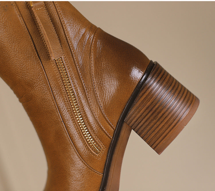 Brown ankle boots with thick heel in British style