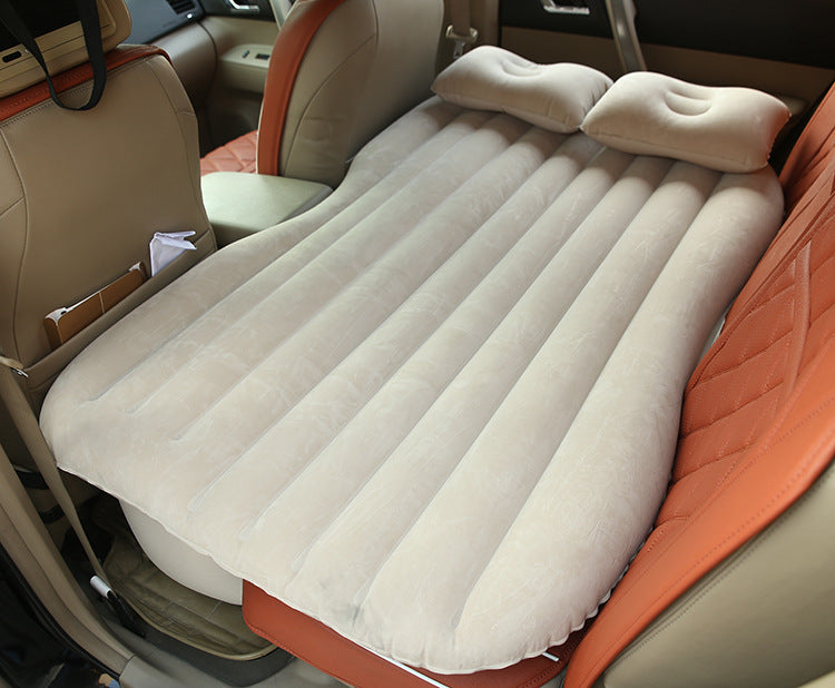 Inflatable bed for the car