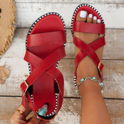 Neue Schnalle Römersandalen Sommermode Einzeilige Cross-Strap-Design Strandschuhe für Frauen Flache Slides Hausschuhe mit niedrigem Absatz