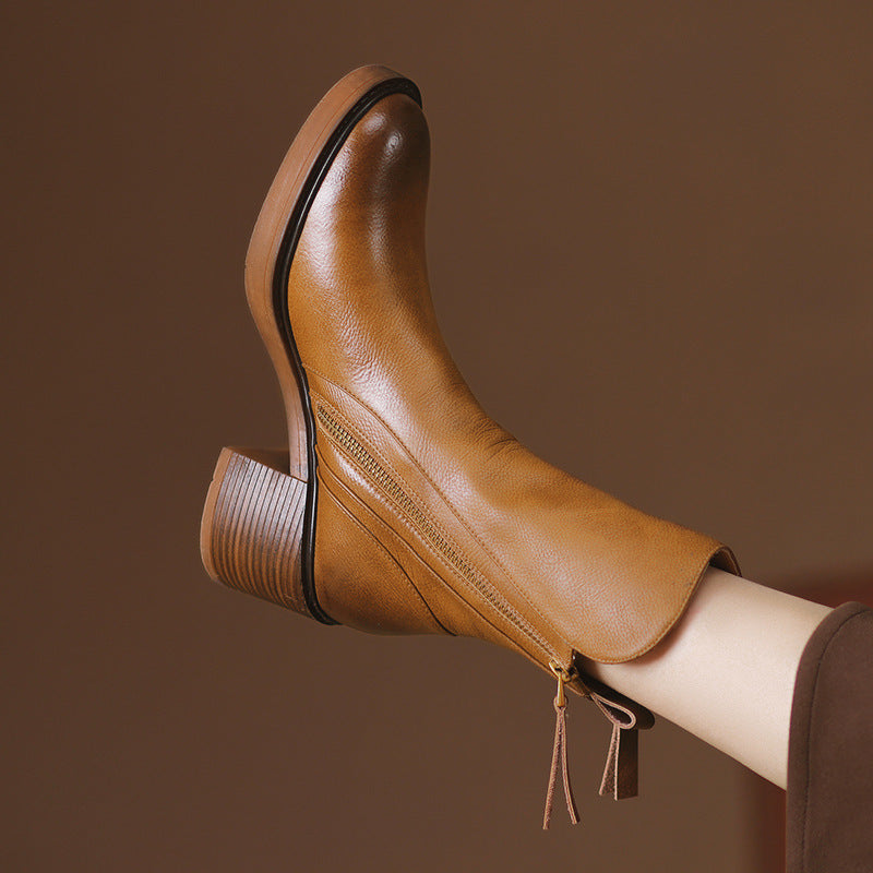 Brown ankle boots with thick heel in British style