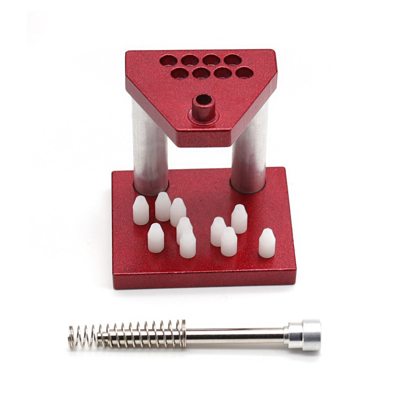 Red Metal Watch Needle Press