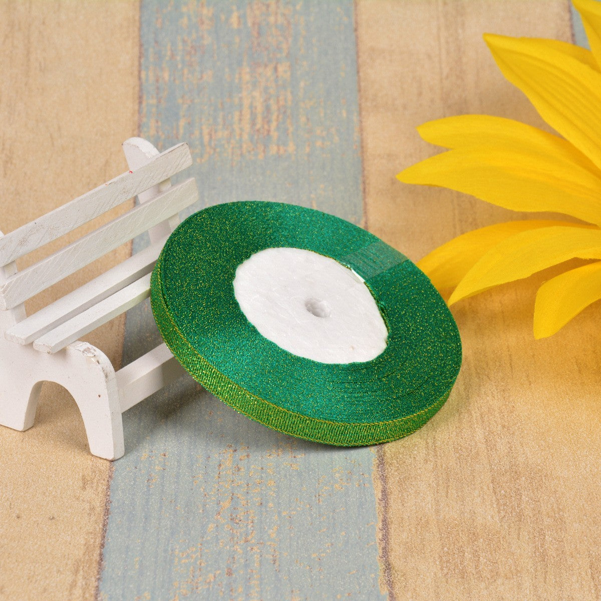 Colorful green roll with 3 dots bow made of gold, silk and silver, polyester ribbon, 1 cm