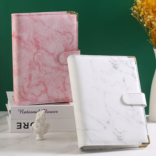 Removable notepad with marble pattern